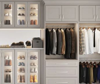 A clean, organized closet with grey cabinets